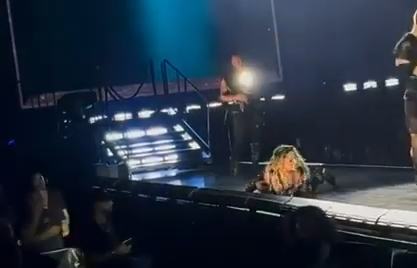 Madonna falls on stage during concert
