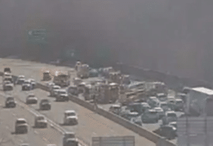 Angry Motorist Stabs 3, Killing Woman and Dog