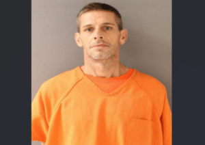 Son Shoot Father in Head as He Watched Football