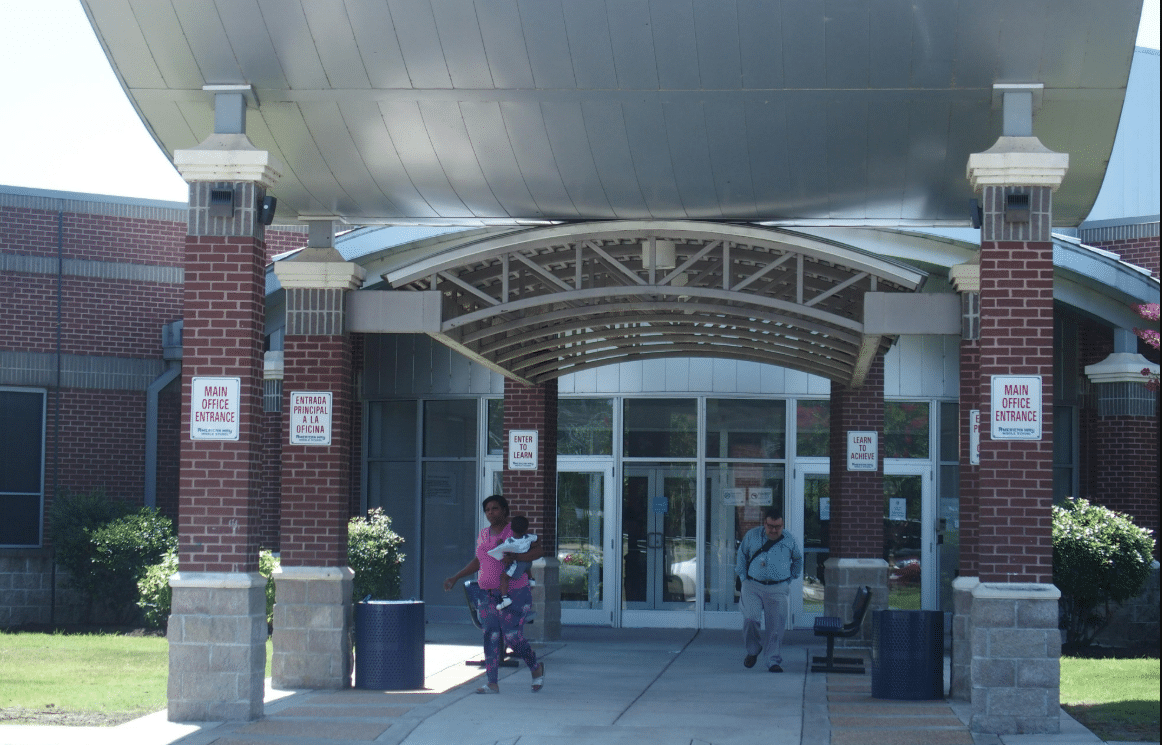 School Worker Charged After Delivery Driver Stabbed Six Times