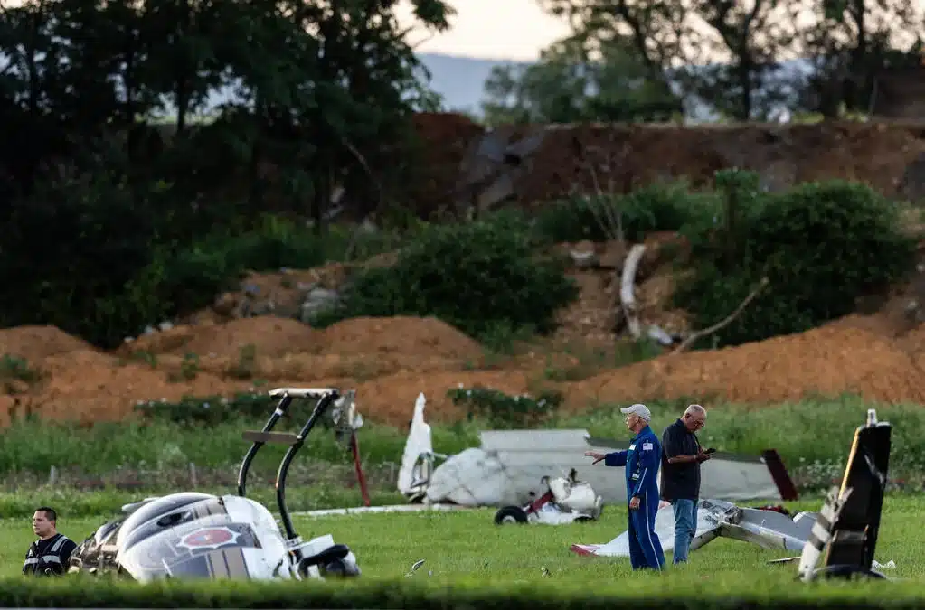 Plane Slams Into Police Helicopter in Deadly Airport Collision